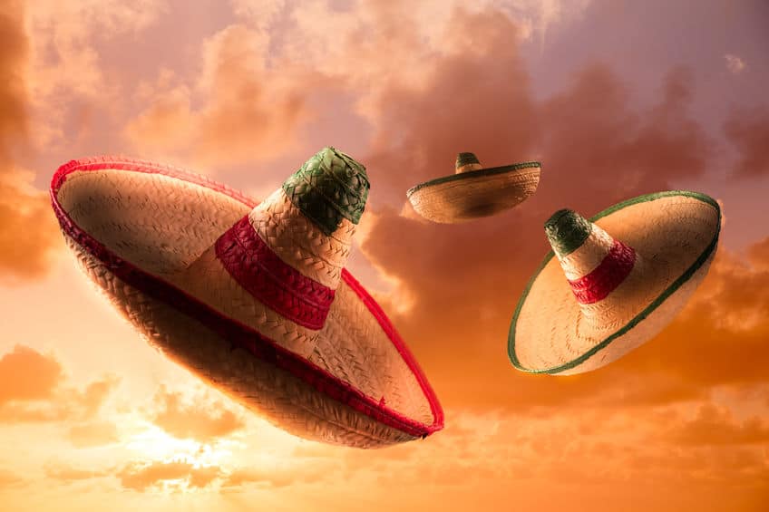 High contrast image of Mexican hats / sombreros in the sky
