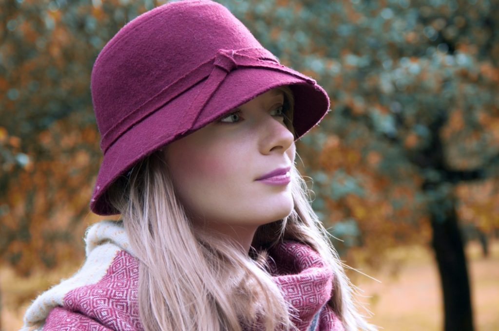 Women wearing purple cloche hat