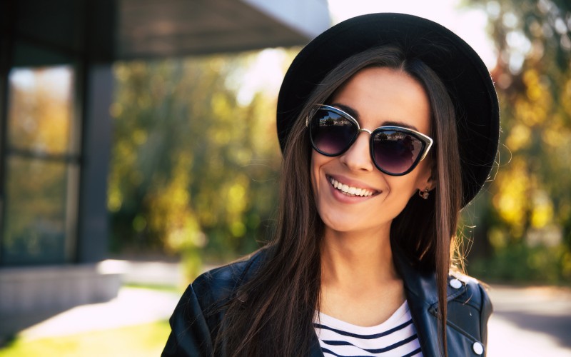 Woman wearing a black hat