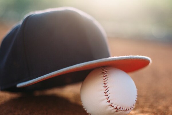 A baseball cap and baseball