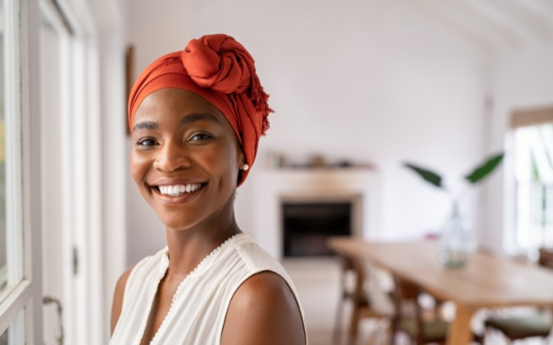 Woman wearing an orange turban