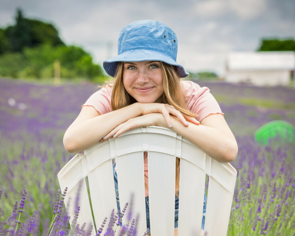 women smiling wearing a bucket hat