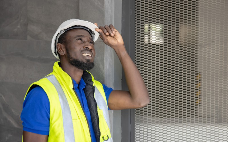 Construction worker wearing a white hard hat