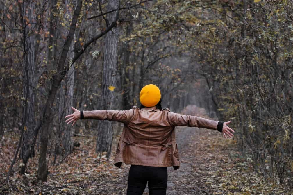 women wearing a beret with leather jacket