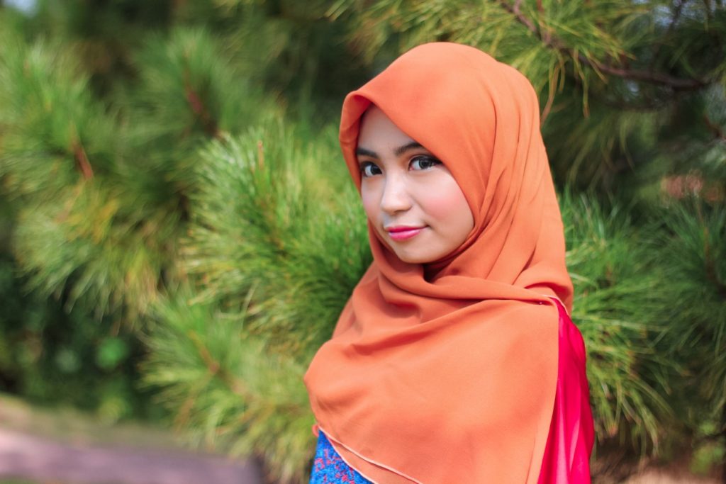 woman wearing orange hijab