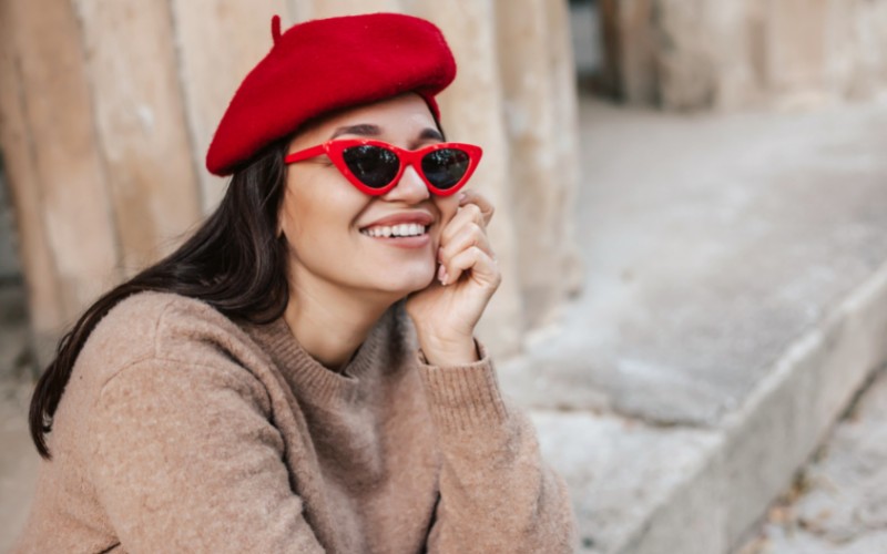 woman wearing a beret with glasses