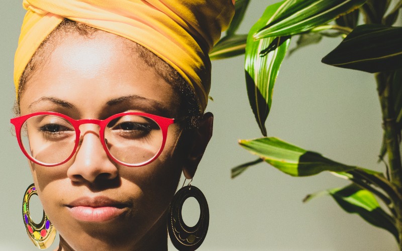 woman wearing a turban with glasses