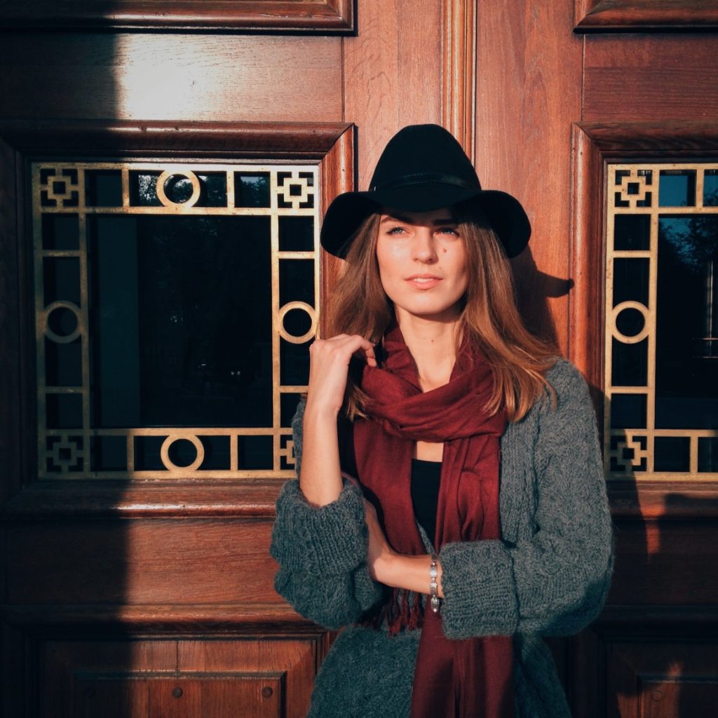 women wearing felt hat and silk scarf