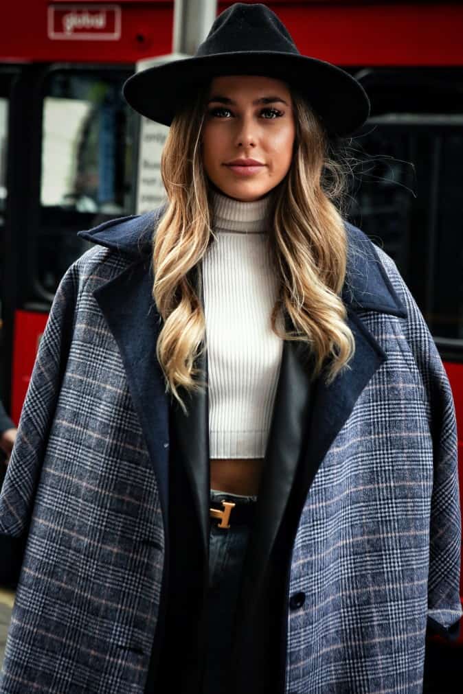 Woman wearing fedora with long hair