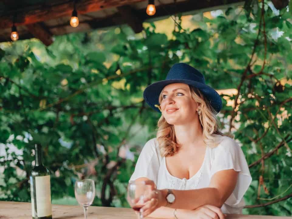 woman wearing a blue fedora