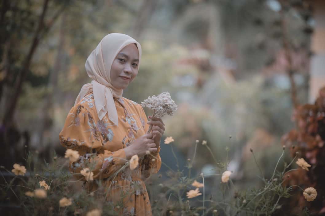 Woman wearing hijab with dress