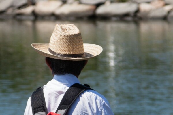 man wearing plantation style Panama hat