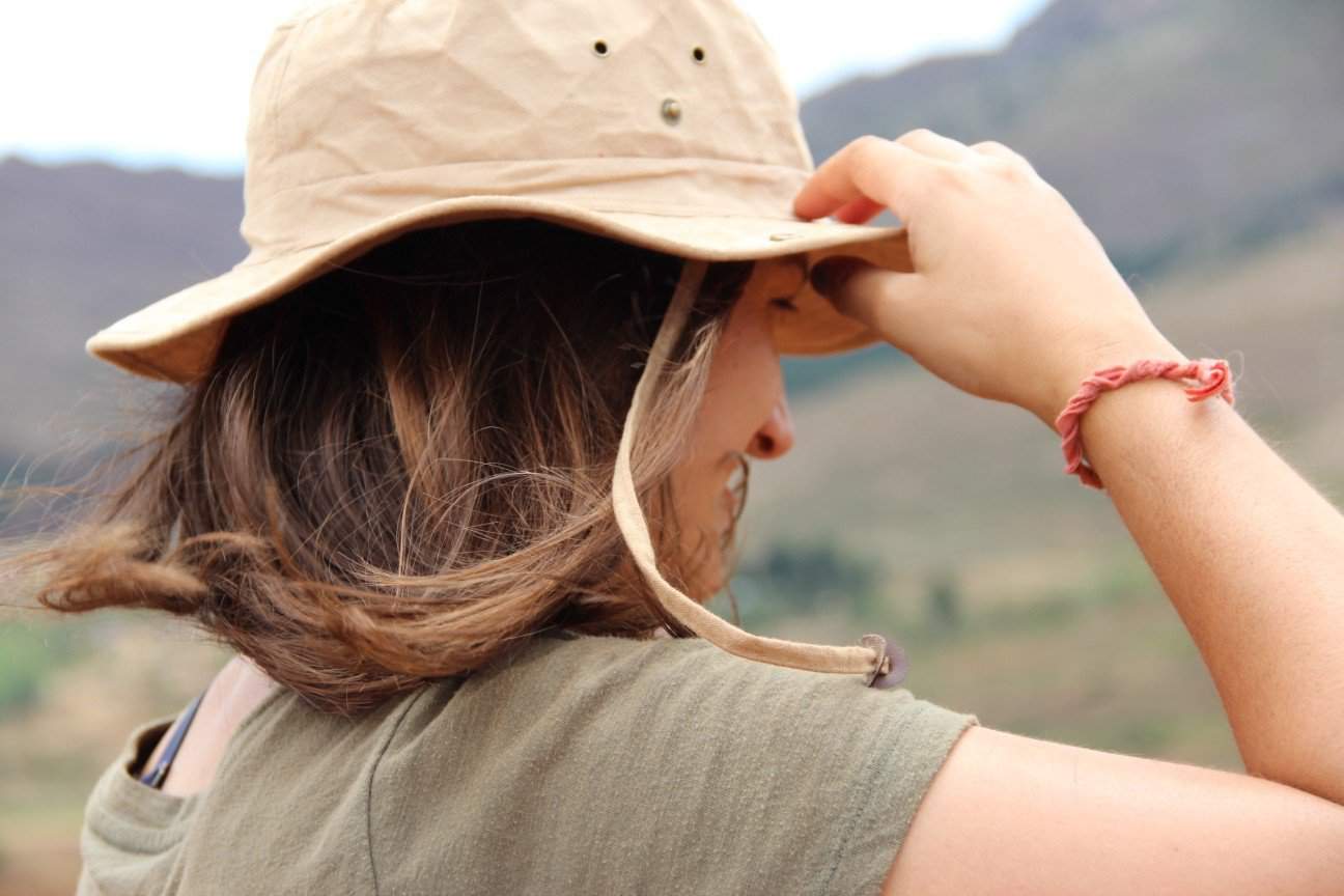 woman wearing safari hat