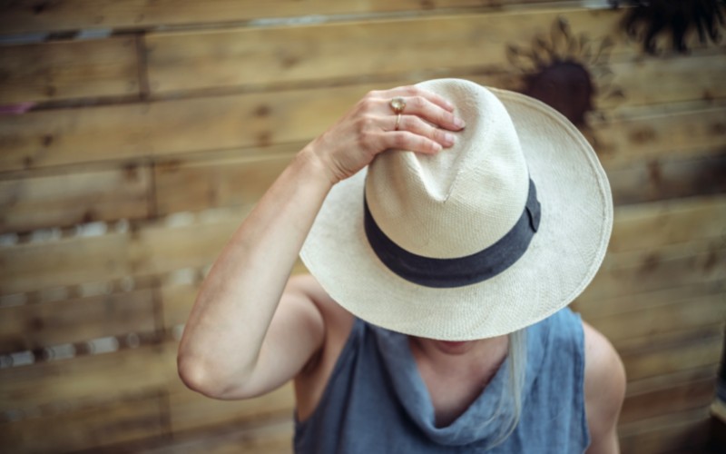 woman wearing a Panama hat