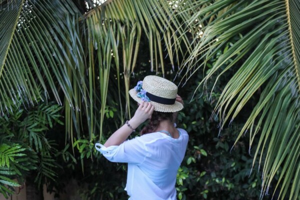 girl wearing boater hat