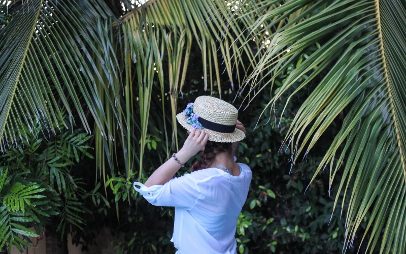 girl wearing boater hat