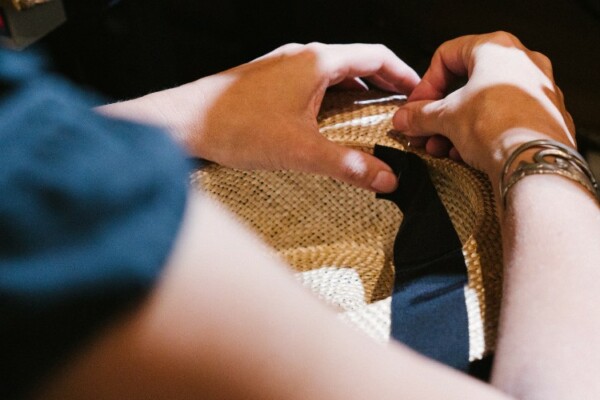 a milliner at work