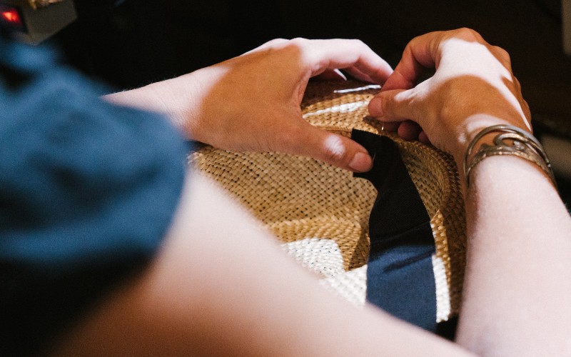 a milliner at work