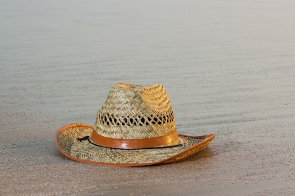 A wet hat on the beach