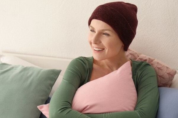 Woman wearing a beanie indoors