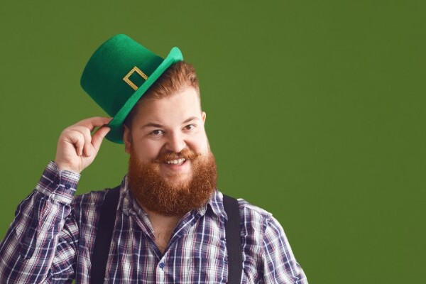 Man wearing a green st patrick day hat