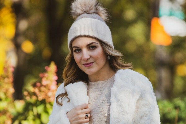 Woman wearing a beanie with wavy hair