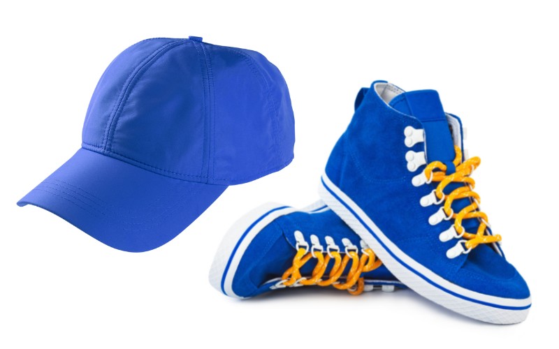 blue sneakers and baseball hat