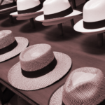 panama hats lined up in a store
