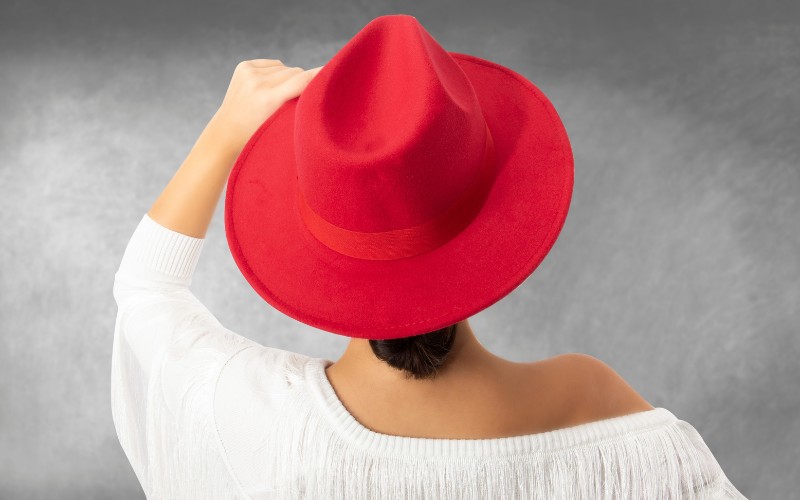 Woman wearing a red hat