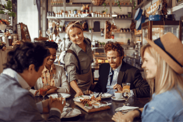 Woman wearing a hat in a restaurant